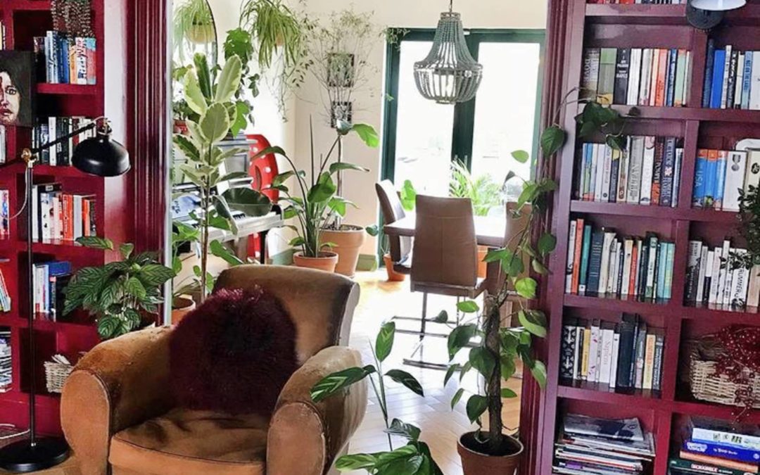 A Beautiful Irish House Has Incredible Bold Burgundy Bookshelves