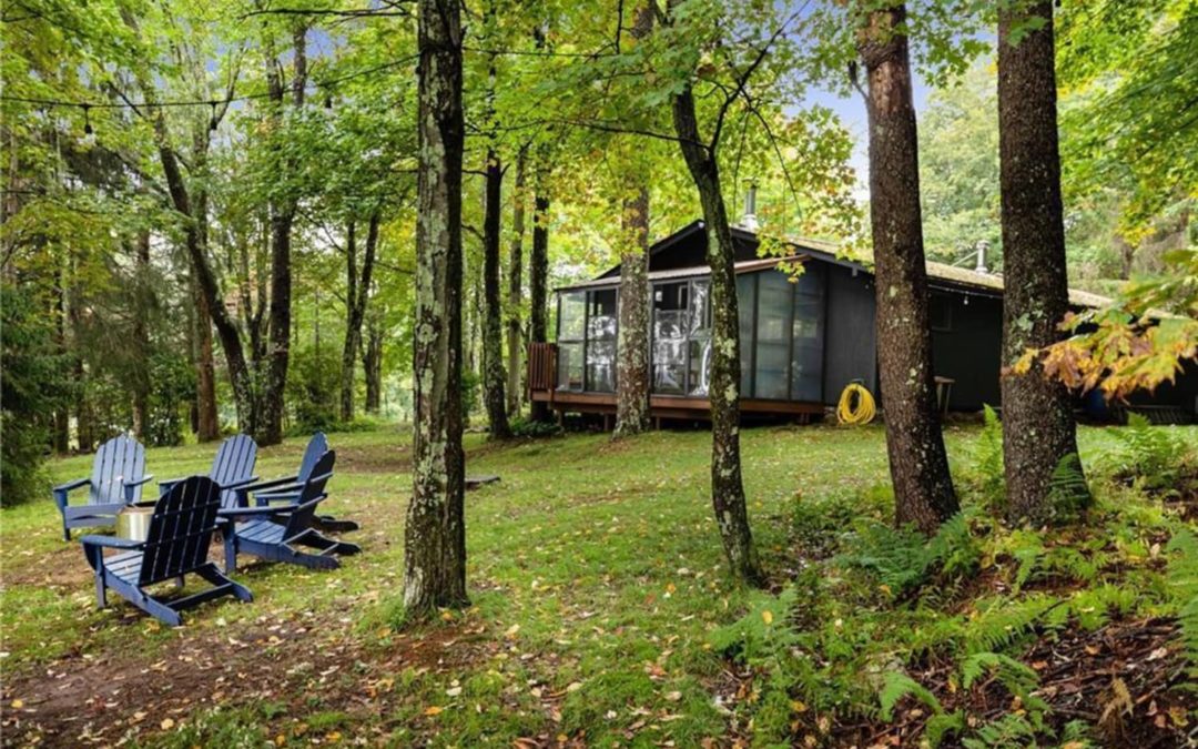 This Cabin for Sale in Upstate New York Has a Screened-In Porch and a Wood Stove