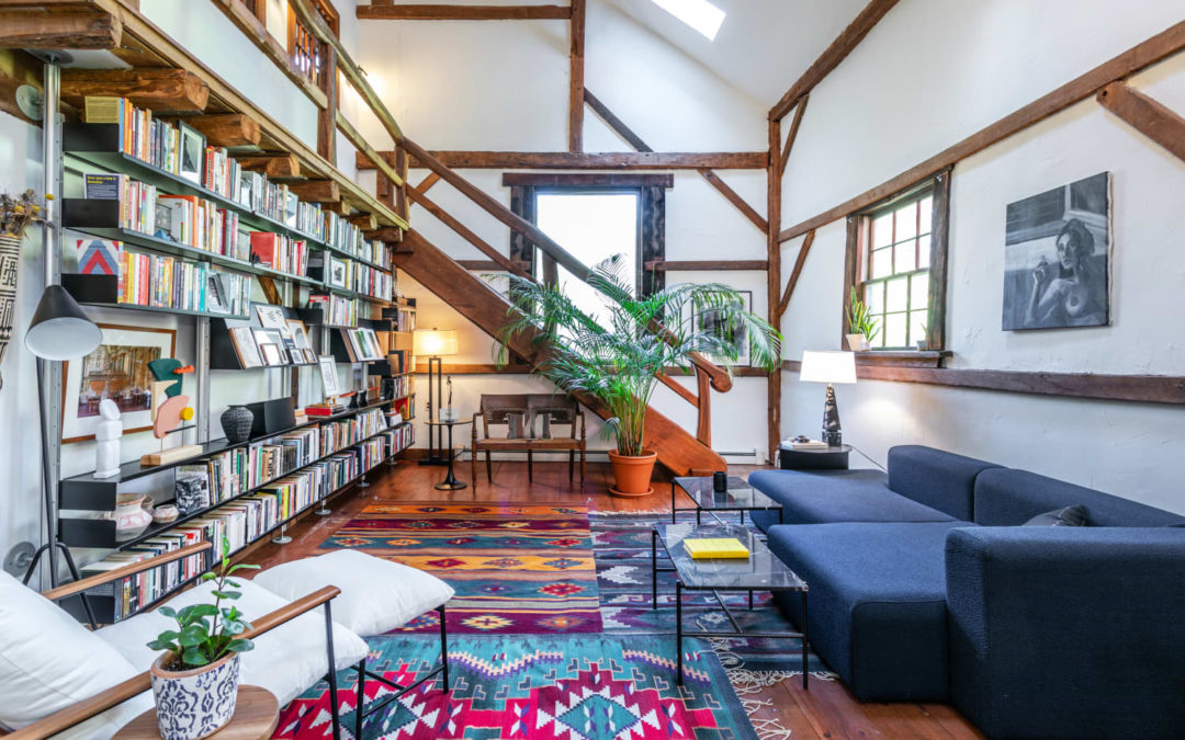 This Converted Dairy Barn for Sale Boasts a Wall of Books
