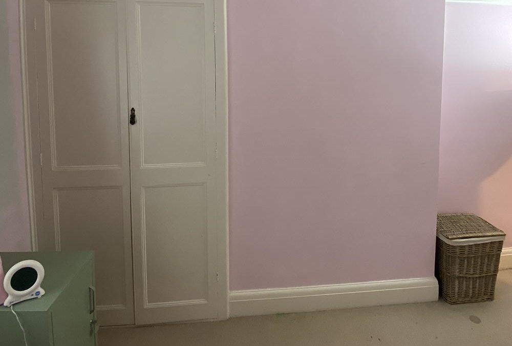 This savvy mum saved £300 creating a rainbow mural with leftover paint and string