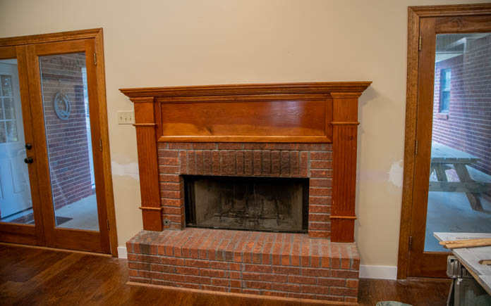 How to Whitewash a Brick Fireplace