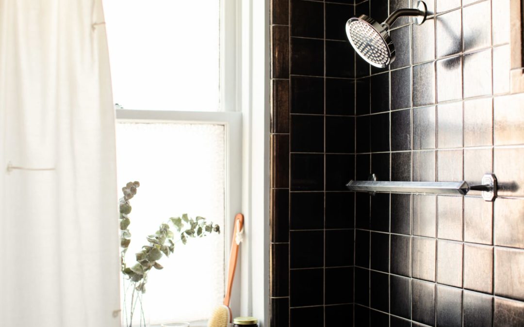 This $18 Shower Mirror Doubles as Storage — and Installs in Seconds