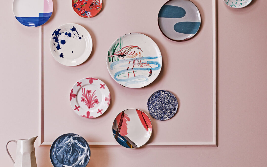 Elton John’s granny chic kitchen dials up the luxe factor with this unusual gallery wall trick – this is why you should be taking your artwork to the floor