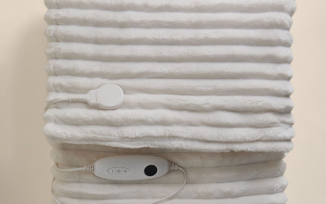 ‘I went back and bought another one’ – the super cosy M&S fleece heated throw shoppers can’t get enough of